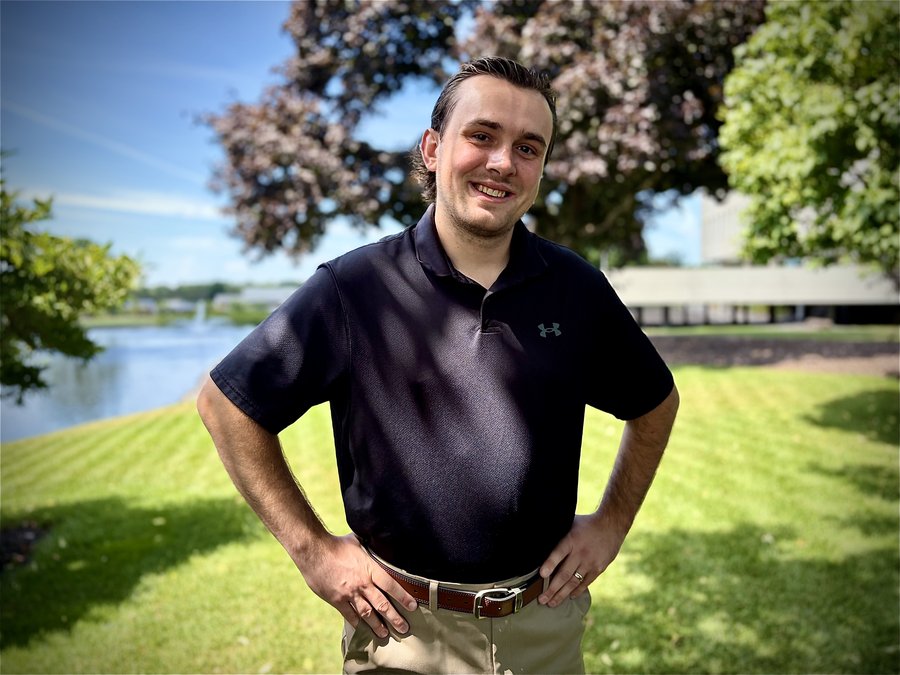 Jordan, founder of Envision Bookkeeping, smiling outdoors